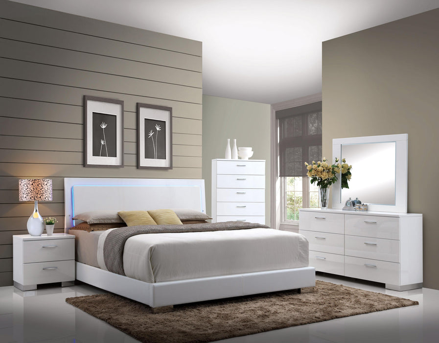 Lorimar White PU & Chrome Leg Eastern King Bed - Marjories Furniture (Las Vegas, NV)