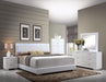 Lorimar White PU & Chrome Leg Eastern King Bed - Marjories Furniture (Las Vegas, NV)